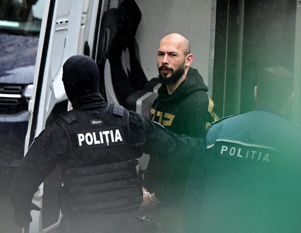 TOPSHOT-ROMANIA-BRITAIN-US-COURT-CRIME 