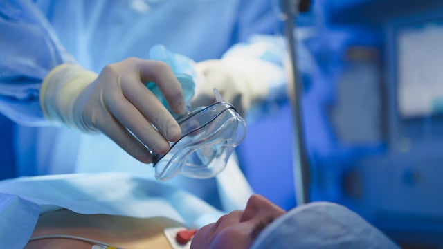 Close-up of mature patient during operation. 