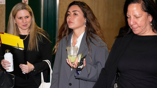 Miriam Haley, center, an accuser testifying at Harvey Weinstein's rape trial, arrives to the courtroom after a break in New York, Tuesday, April 29, 2025. 