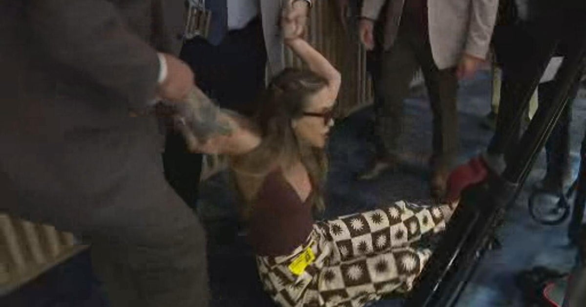 Video shows woman dragged out of Miami-Dade commission meeting 
